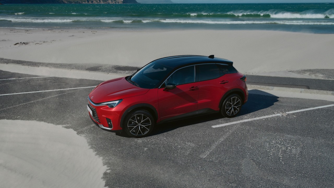 Lexus LBX parked on a beachfront