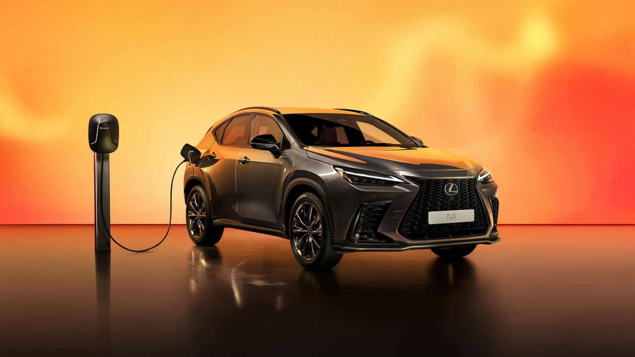 Lexus NX plugged into a charging tower