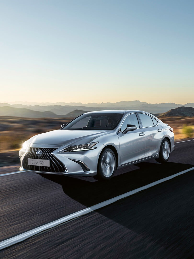 Lexus ES 300h driving on a desert road 