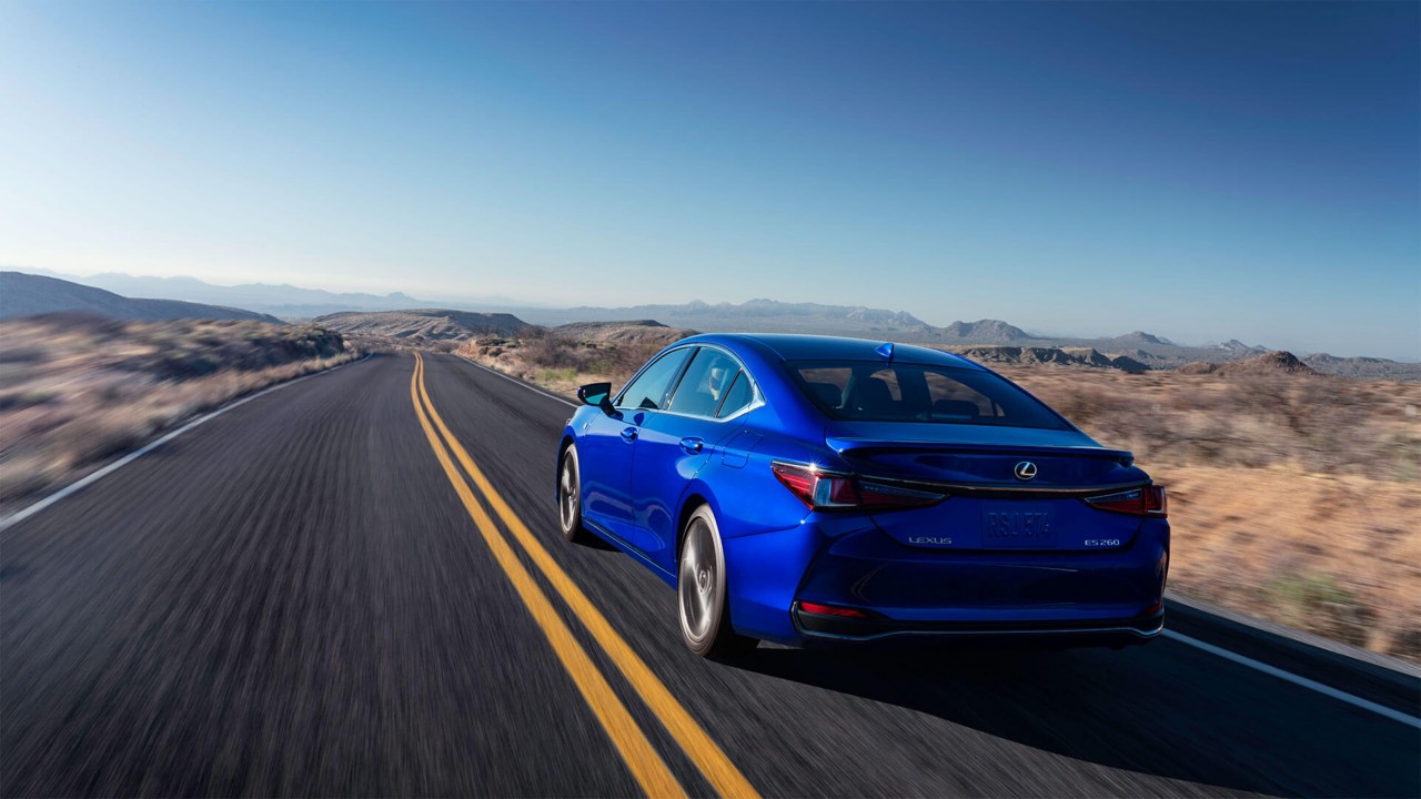 Lexus ES driving in a rural location 