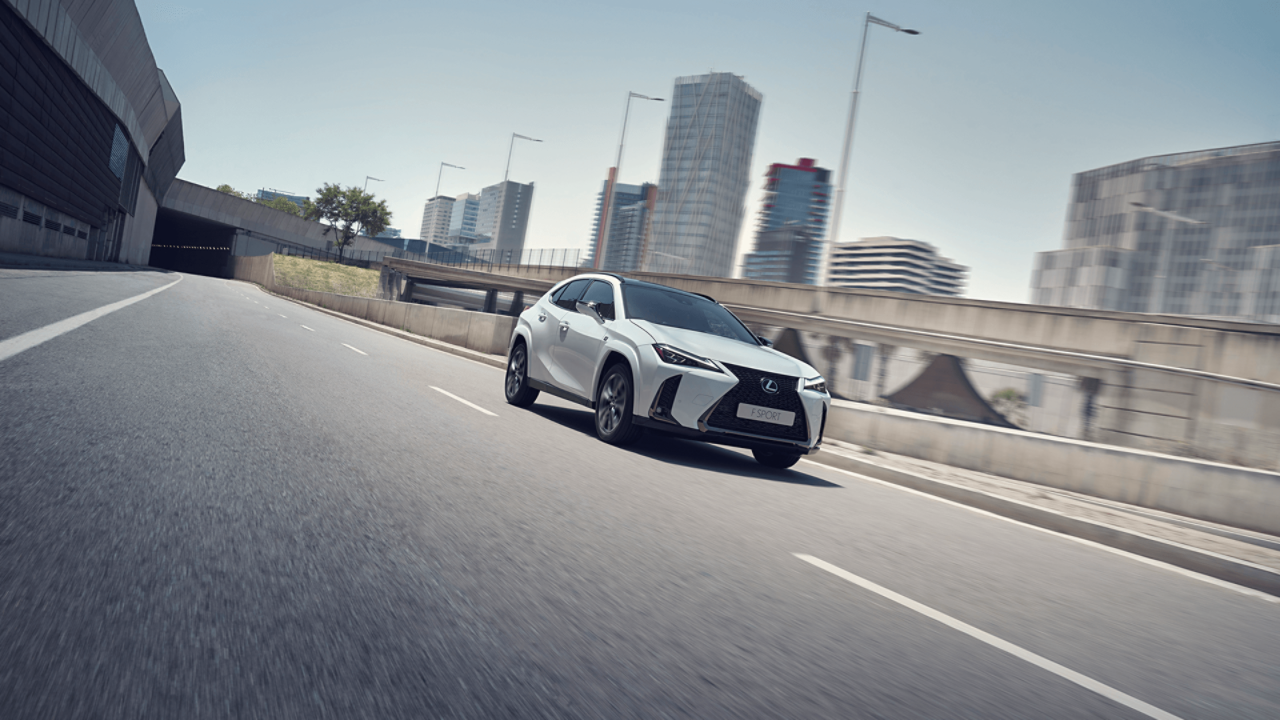 Lexus UX F Sport driving on a road