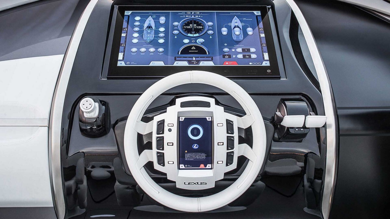 A close up of the Lexus Sport yacht steering wheel and dashboard 
