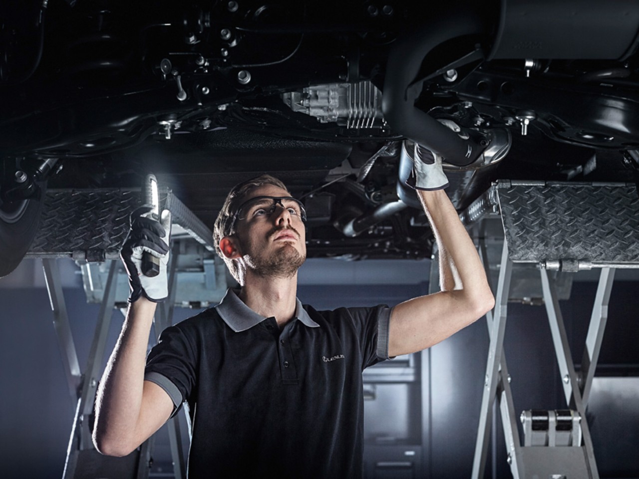 A Lexus mechanic working on a Lexus