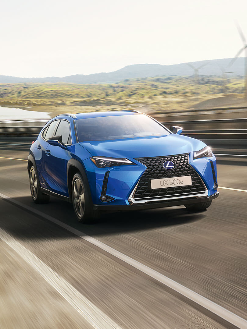 Lexus UX 300e driving on a road