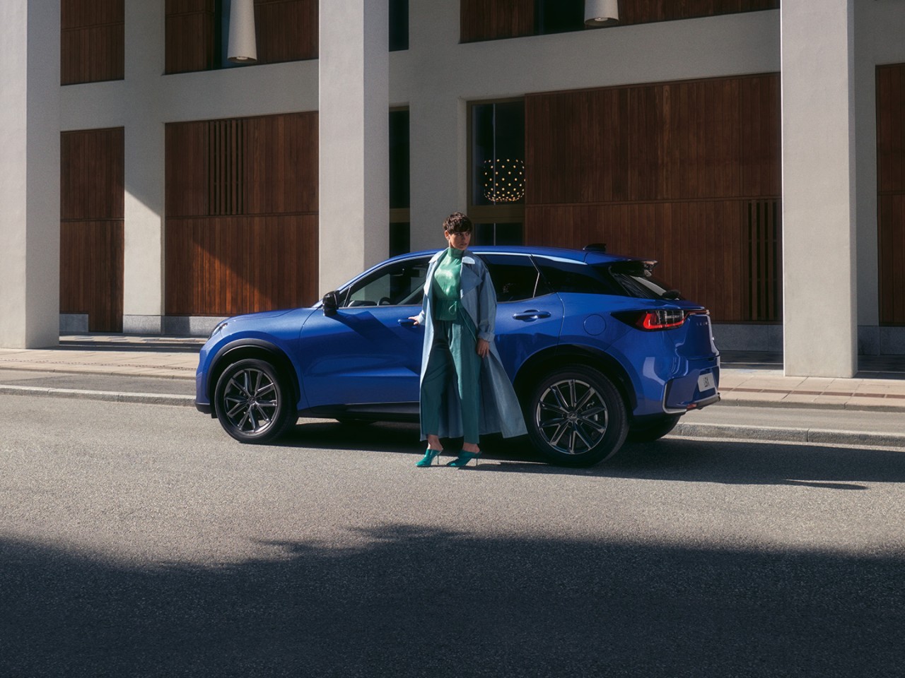  person stood next to a Lexus LBX